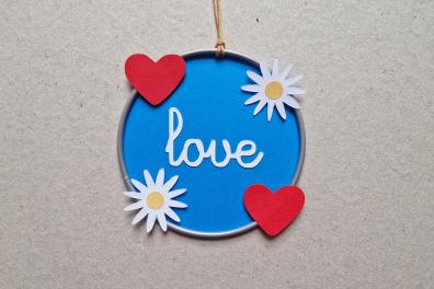 Heart catcher with Love written in the middle