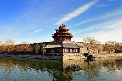 Turret at the corner of the Forbidden City surrounded by water