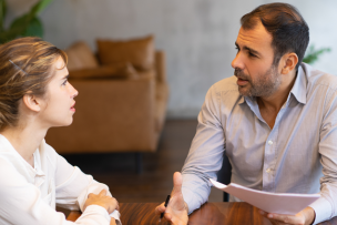 Intern and mentor discussing job specific